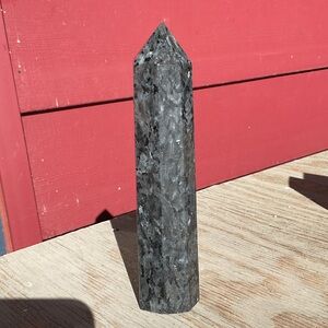 Natural polished Larvikite point